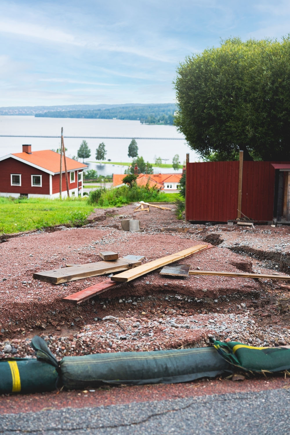 sandbags and destroyed driveway after the extreme weather in Rättvik